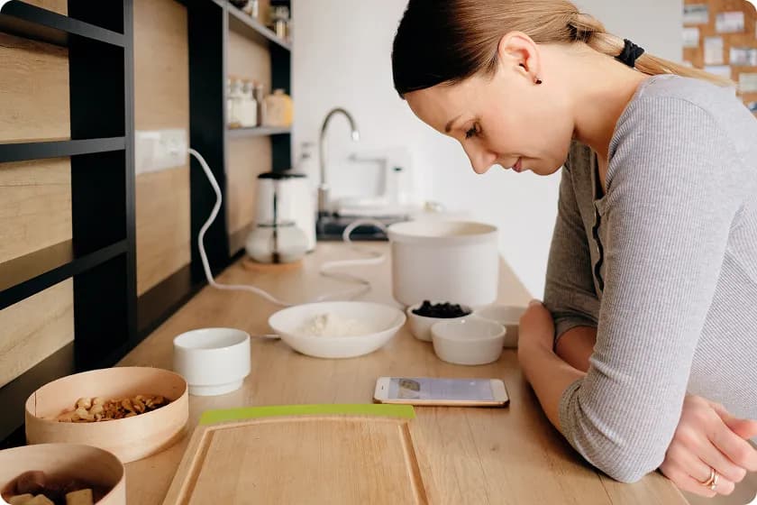Person journaling healthy habits and diet to prevent extreme constipation symptoms naturally every day.
