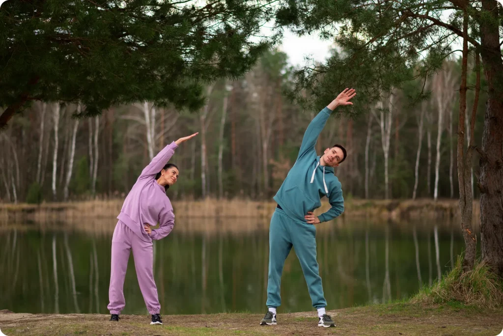 Woman doing yoga to boost gut motility and show how to relieve constipation with gentle movement.