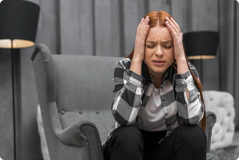Thoughtful adult reviewing symptoms to understand signs your depressed and why awareness matters early.