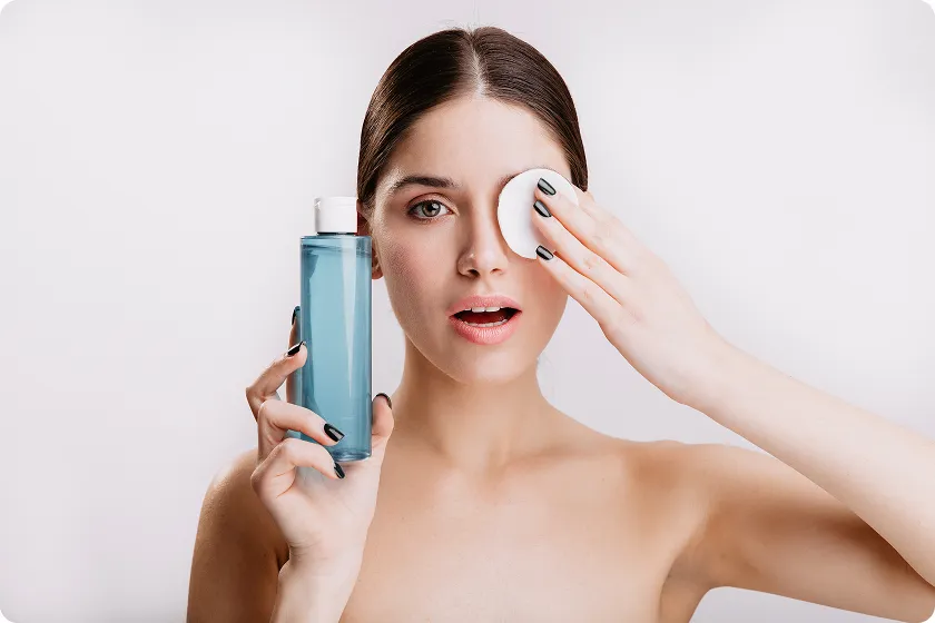 Woman learning a healthy skin care routine for oily skin naturally.