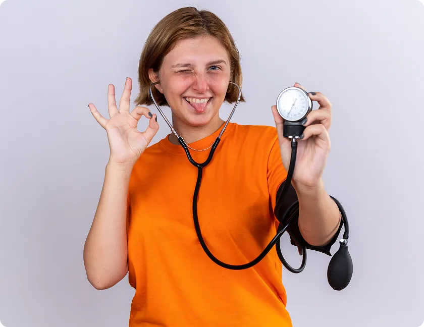 Joyful medical professional demonstrating blood pressure numbers mean what for daily health.