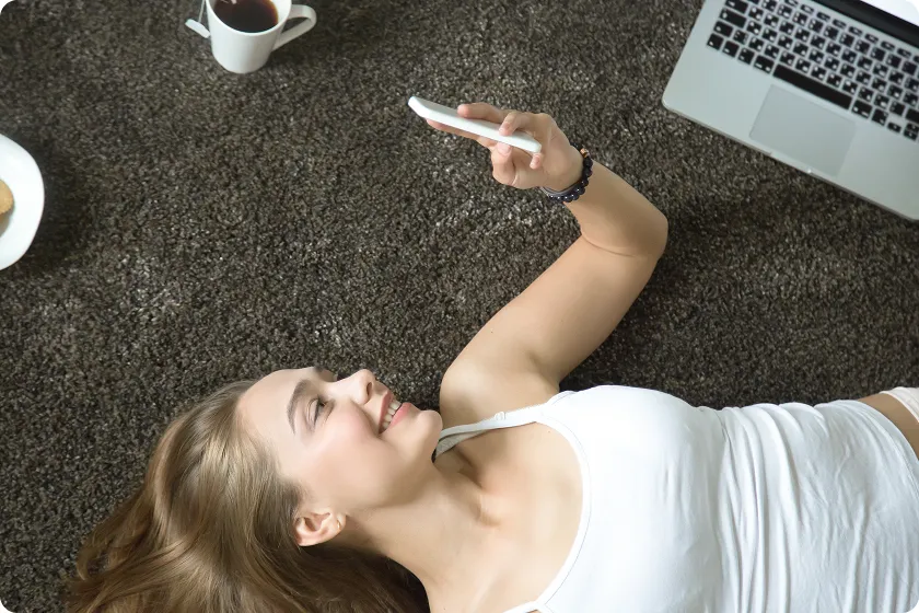 What is a digital detox: illustration showing a person taking a break from smartphones and digital devices to reduce screen time stress.